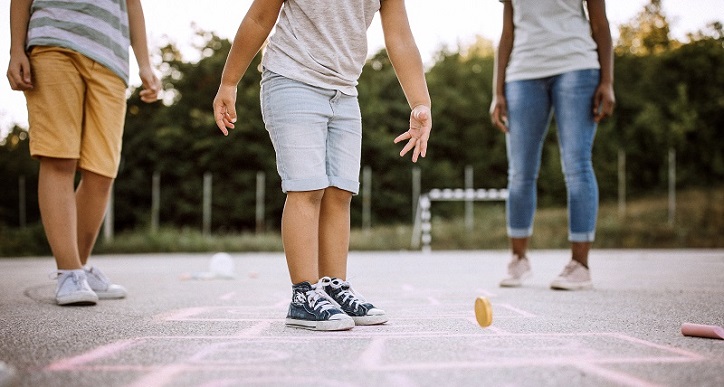 Children playing hopscotch