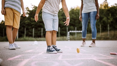 Children playing hopscotch